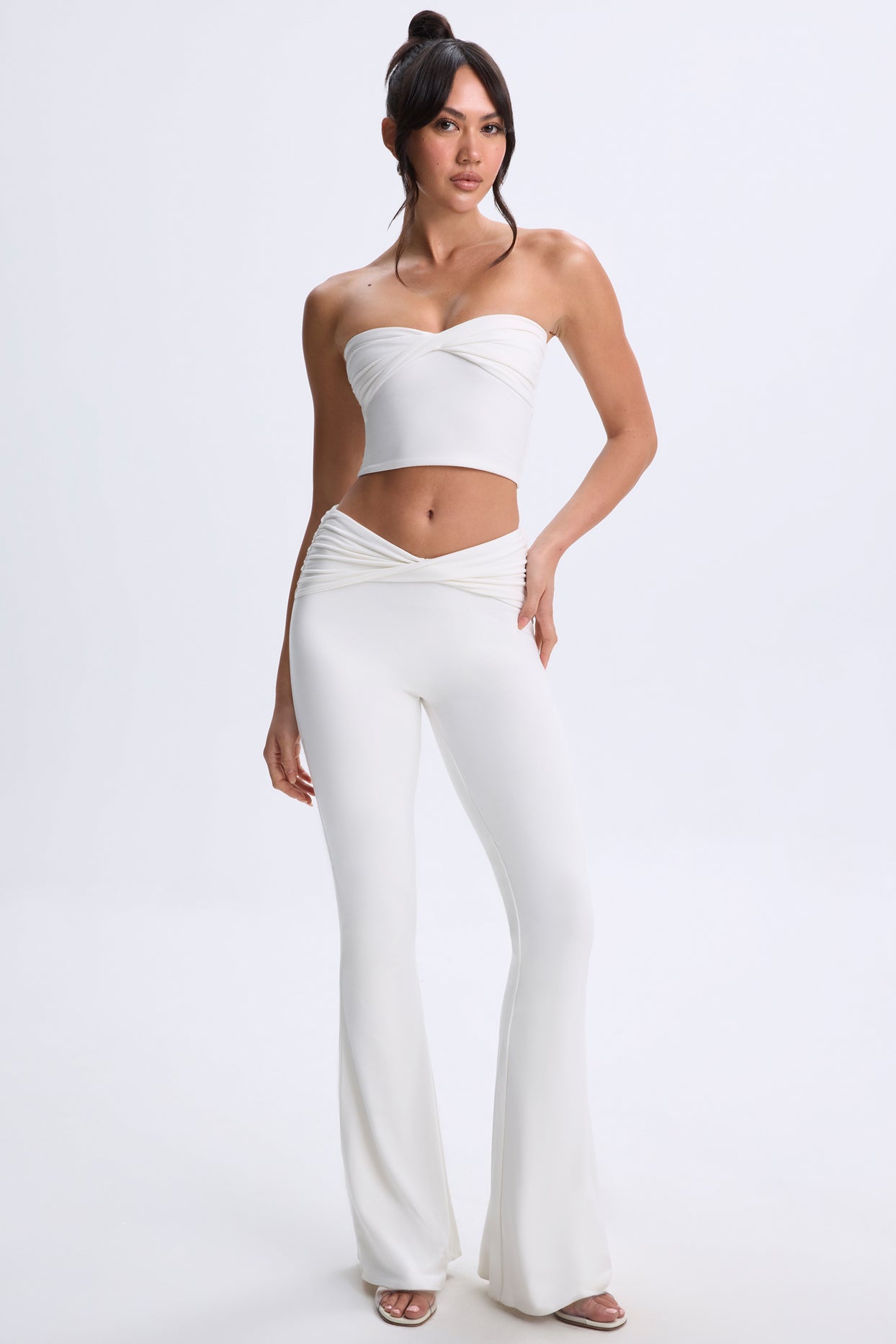 Twist-Front Flared Trousers in White | Oh Polly