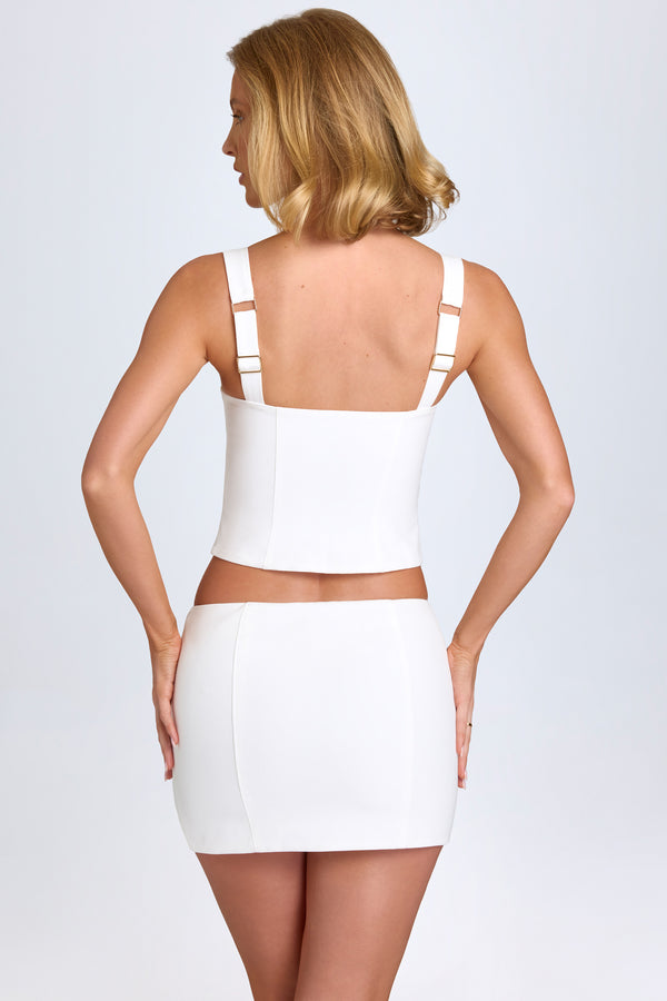 Curved Low-Rise Mini Skirt in White - 2