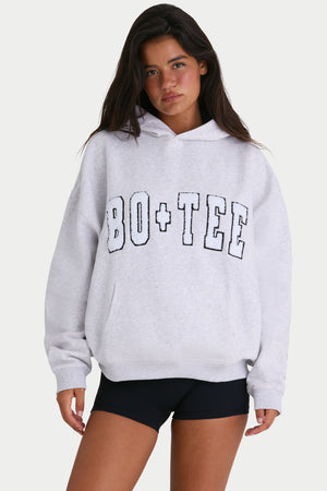 Bo+Tee model Kiele wearing the Off-Duty Hoodie in Heather Grey Cotton fabric perfect for casual outings