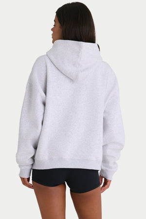 Bo+Tee model Cristal wearing the Off-Duty Hoodie in Heather Grey Cotton fabric perfect for weekend errands