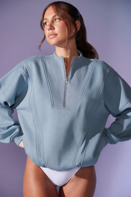 Sweat-shirt surdimensionné à demi-zip en bleu denim
