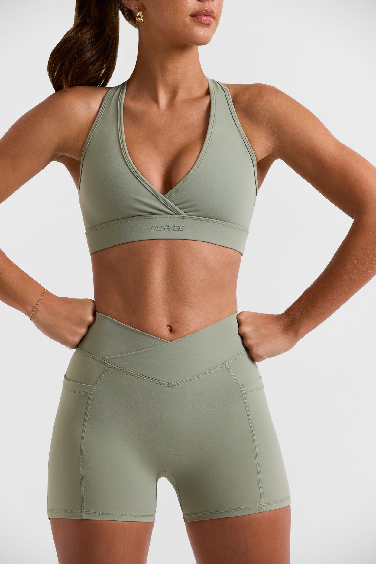 Volley Cut Out Back Sports Bra in Bamboo Green