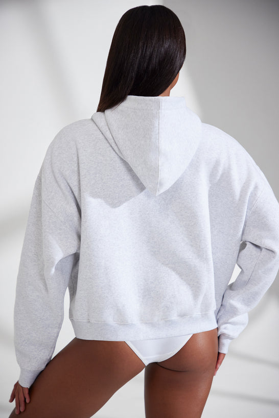 Sweat-shirt à capuche surdimensionné en gris chiné