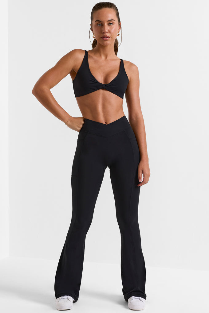 Soft Active Wrap Over Flared Leggings in Black