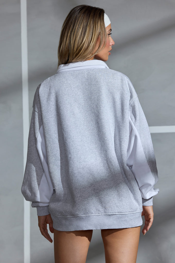 Sweat-shirt surdimensionné à demi-zip en gris chiné