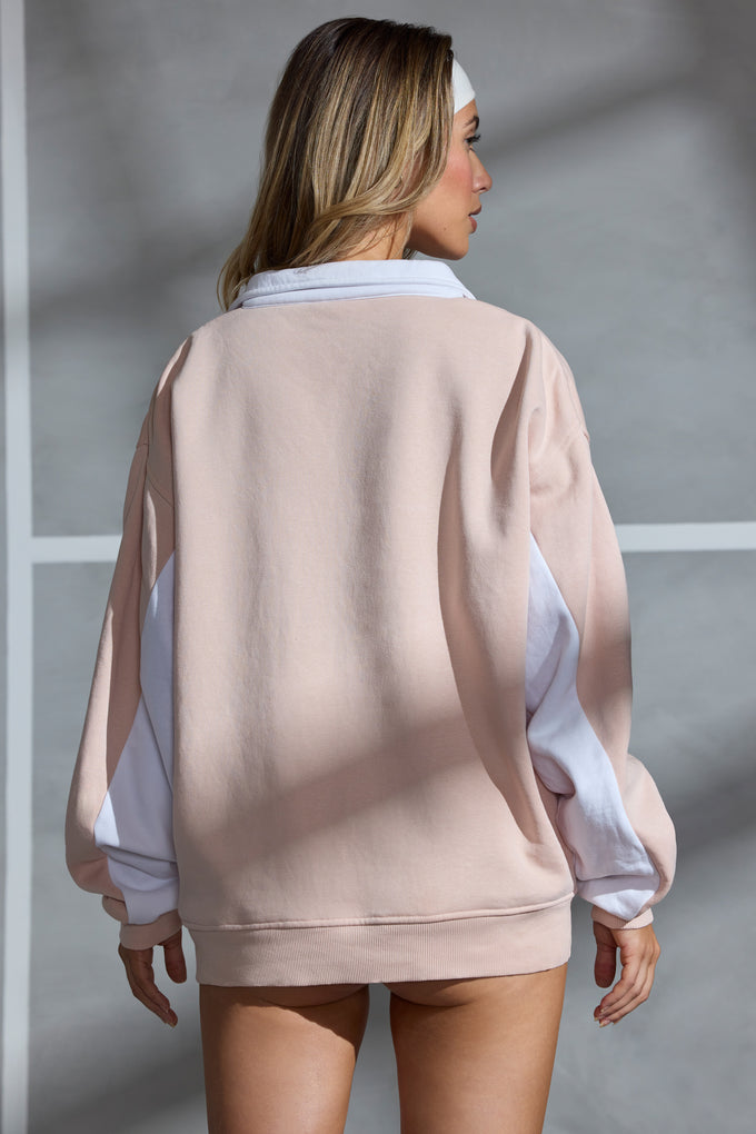 Bluza oversize z zamkiem błyskawicznym i panelem w kolorze miękkiej brzoskwini