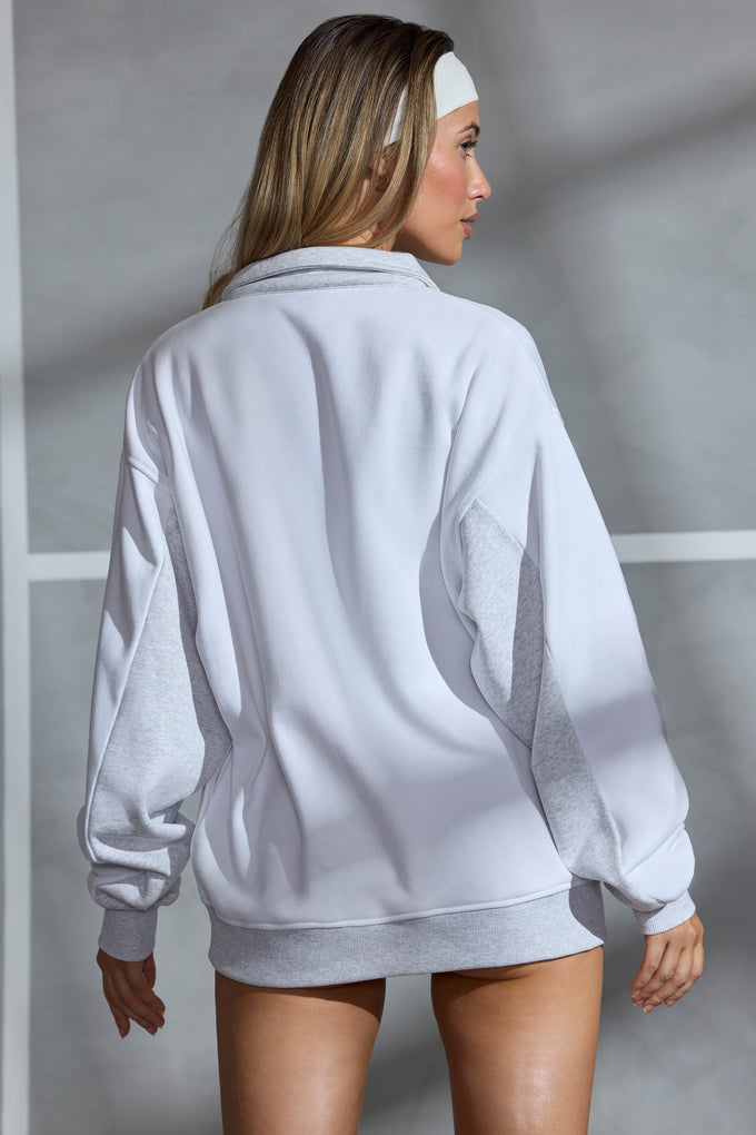 Sweat-shirt oversize à demi-zip en blanc