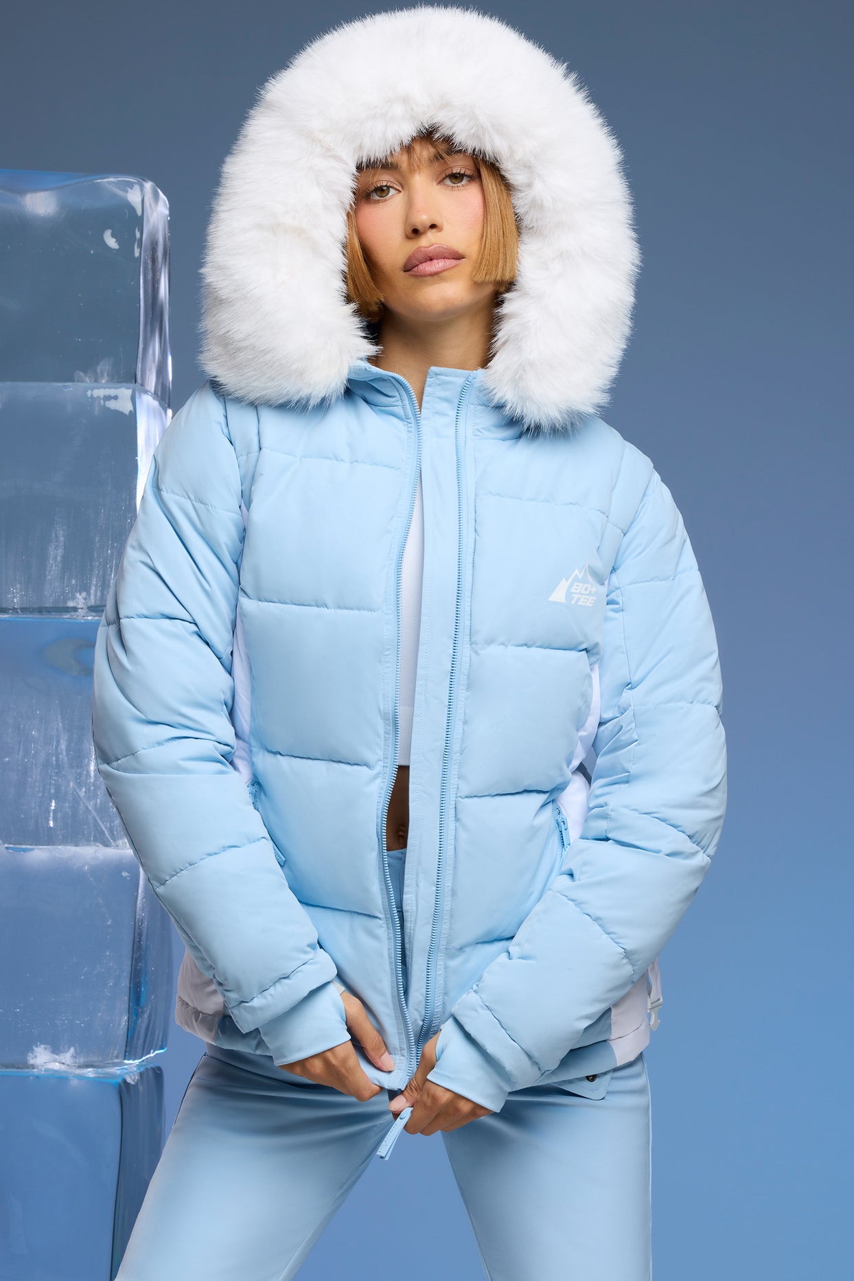 Alpine Ski Jacket with Detachable Sleeves in Baby Blue Oh Polly