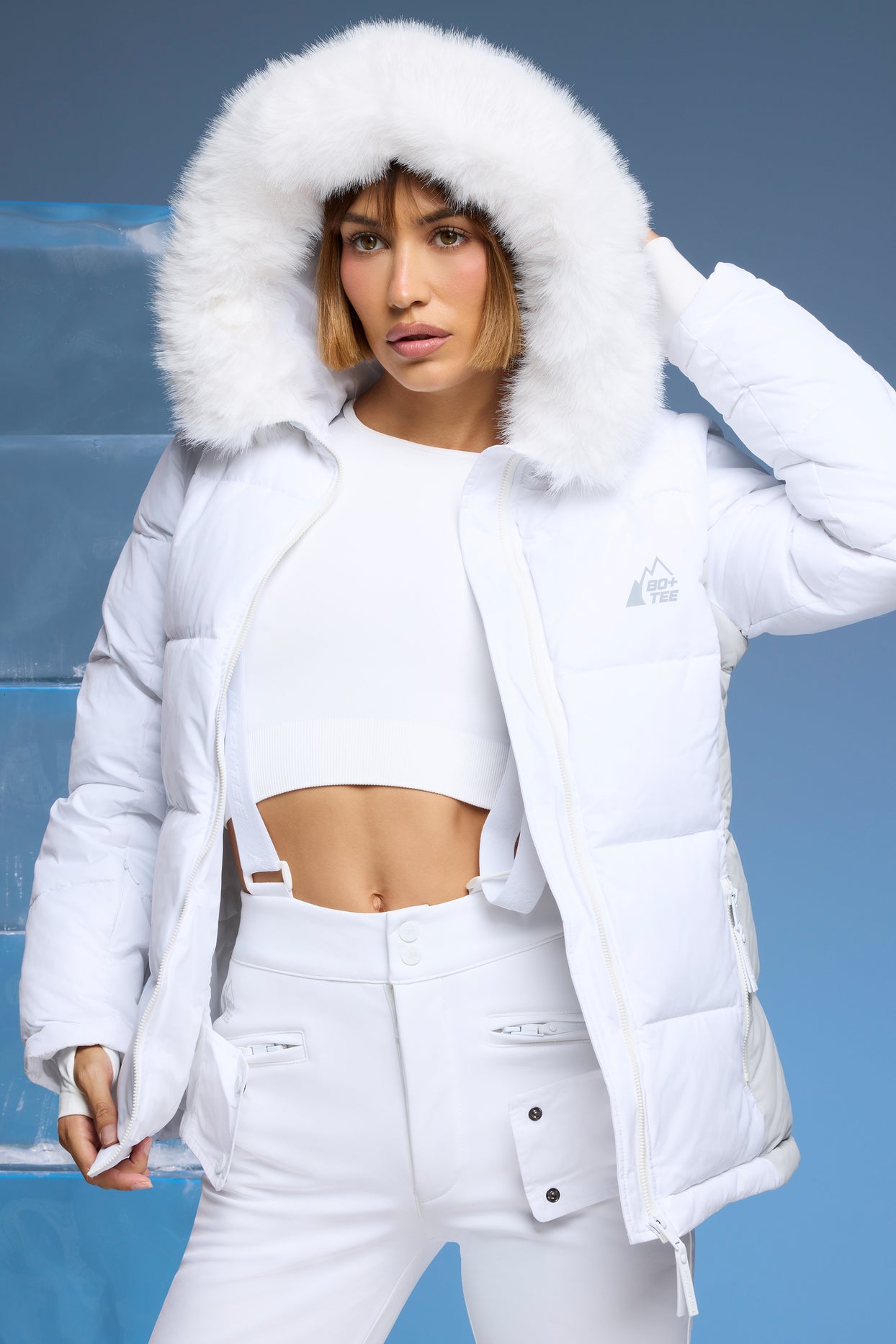 Alpine Ski Jacket with Detachable Sleeves in White | Oh Polly