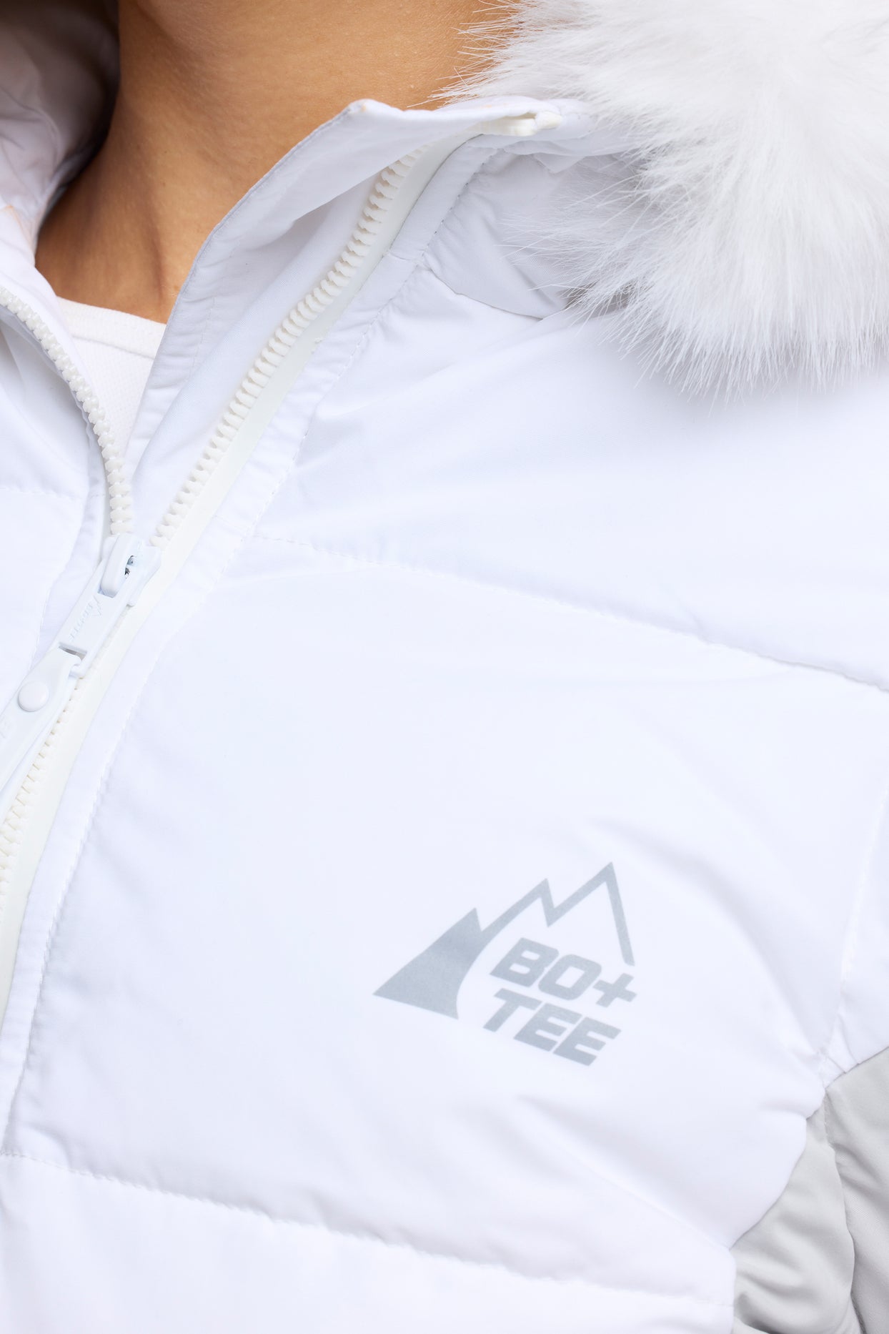 Alpine Ski Jacket with Detachable Sleeves in White Oh Polly
