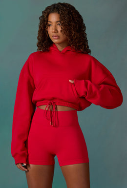 Krótka bluza z kapturem i sznurkiem w kolorze Tango Red