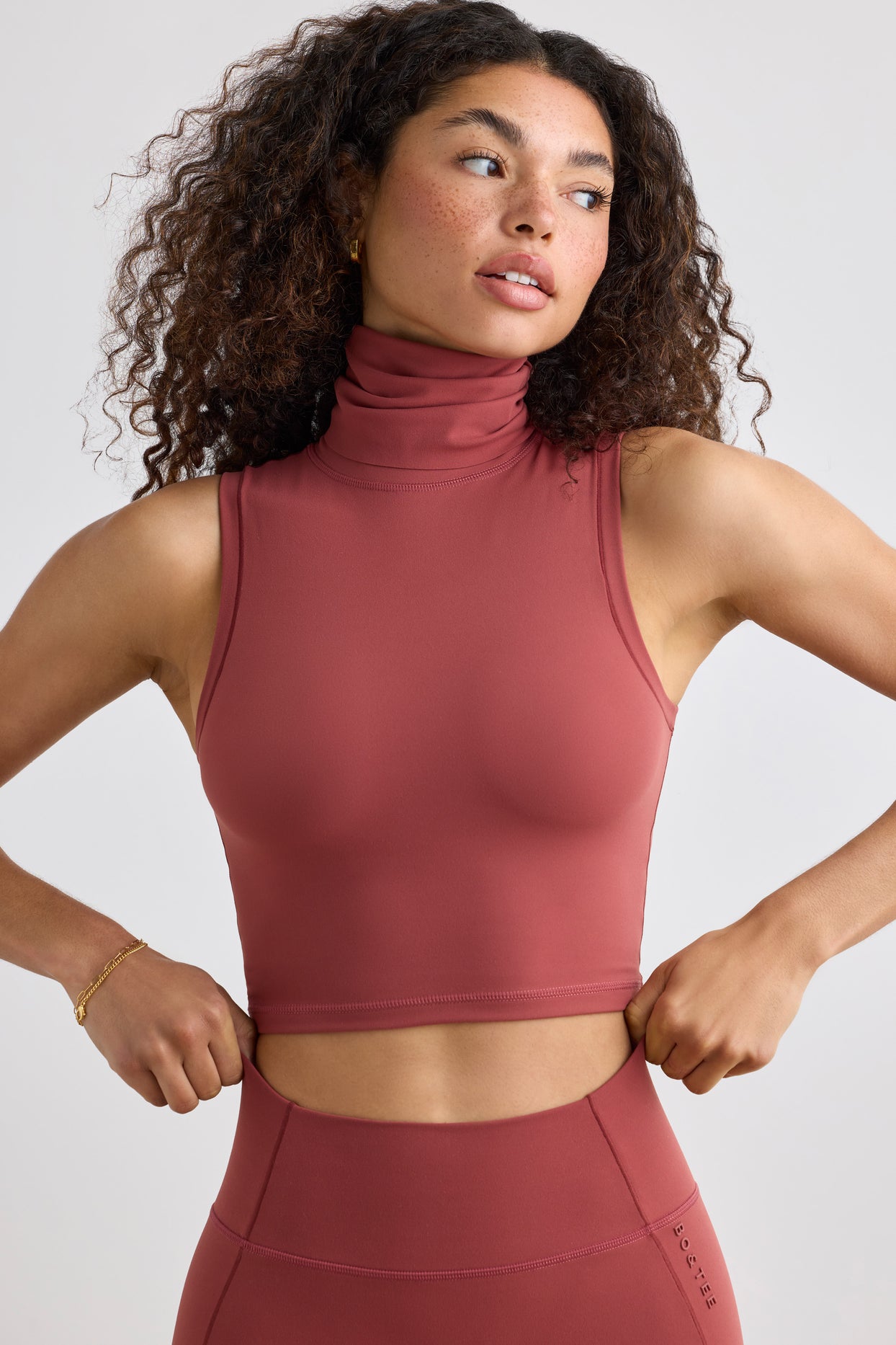 Soft Active Turtleneck Tank Top in Rust | Oh Polly