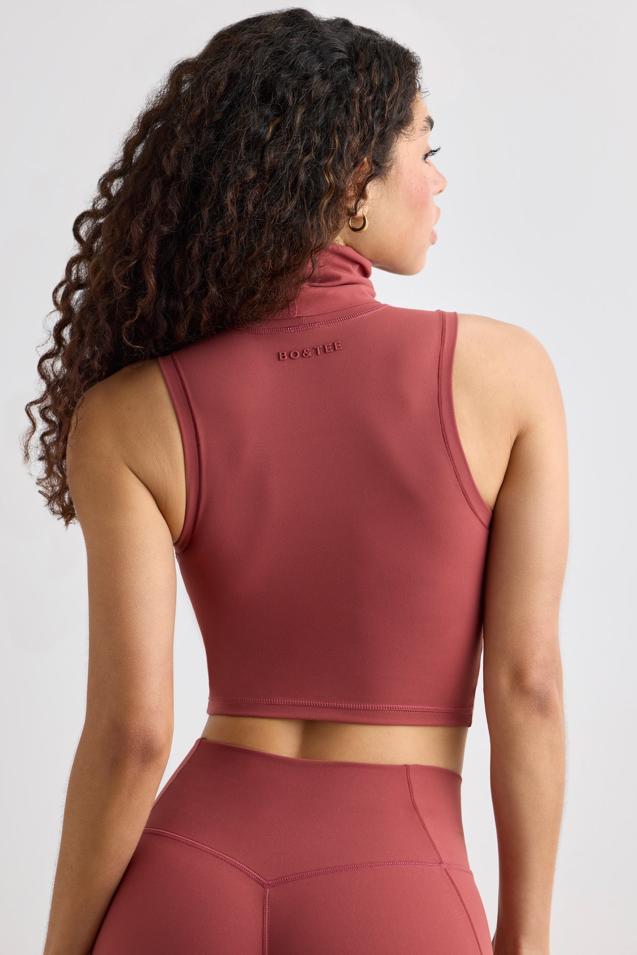 Soft Active Turtleneck Tank Top in Rust | Oh Polly
