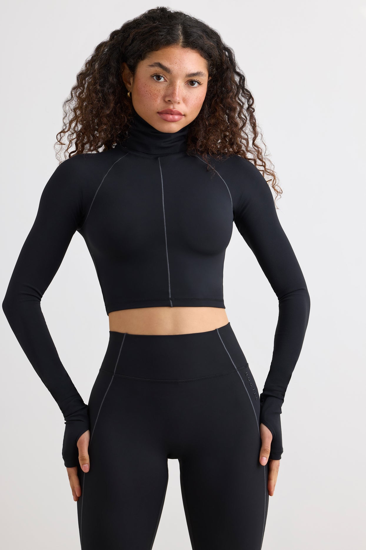 Soft Active Turtleneck Crop Top in Black - 7