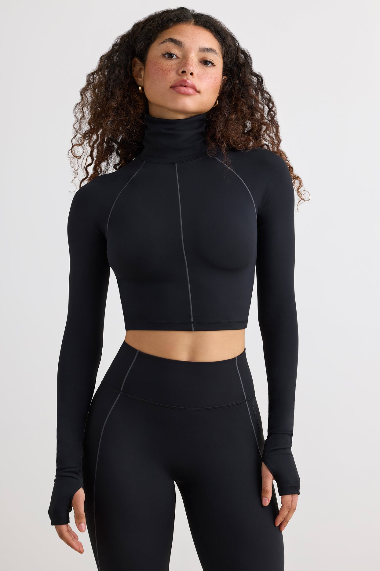 Soft Active Turtleneck Crop Top in Black - 1
