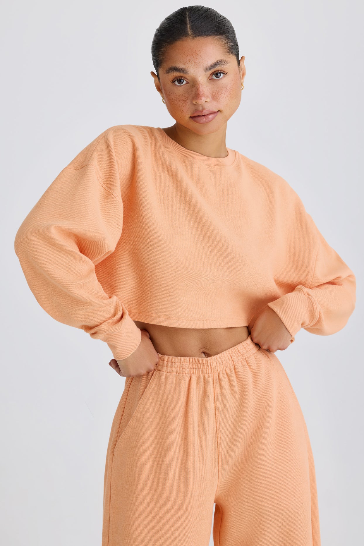 Textured Cotton Jersey Open-Back Cropped Sweatshirt in Peach - 5