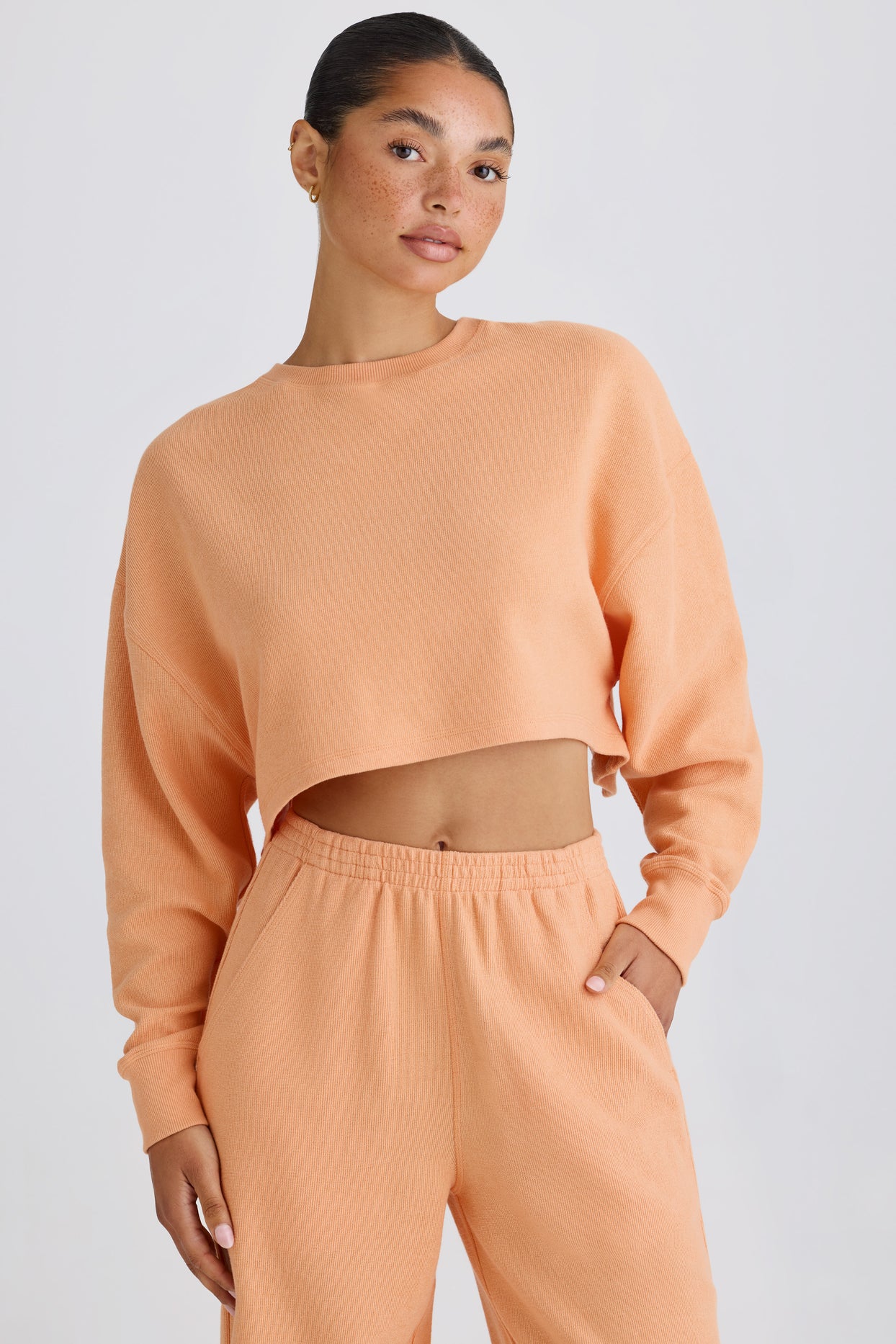 Textured Cotton Jersey Open-Back Cropped Sweatshirt in Peach - 6