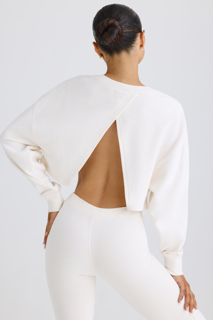 Textured Cotton Jersey Open-Back Cropped Sweatshirt in White - 1