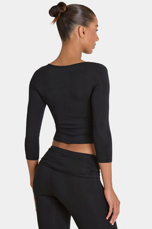 Bo+Tee model Kiele wearing the BT16395__Black Full Top in Black Modal fabric perfect for coffee dates