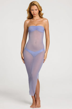 Oh Polly Swim's Bella wearing the Papeete Maxi Dress in Lavender Purple fabric perfect for beachside brunches
