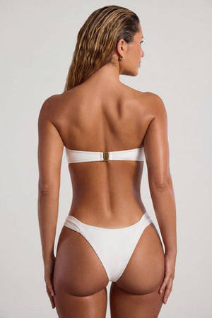 Oh Polly Swim's Sierra Skye wearing the Praslin Bikini Top in Ivory fabric perfect for poolside lounging