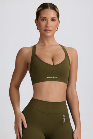 Super Sculpt Seamless Cross-Back Sports Bra in Dark Green