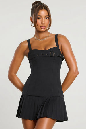 Oh Polly's Kiele wearing the Clover Mini Dress in Black Wool fabric perfect for a holiday party