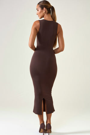 Oh Polly's Priscilla wearing the Ainslee Midaxi Dress in Chocolate Brown Modal fabric perfect for evening cocktail parties
