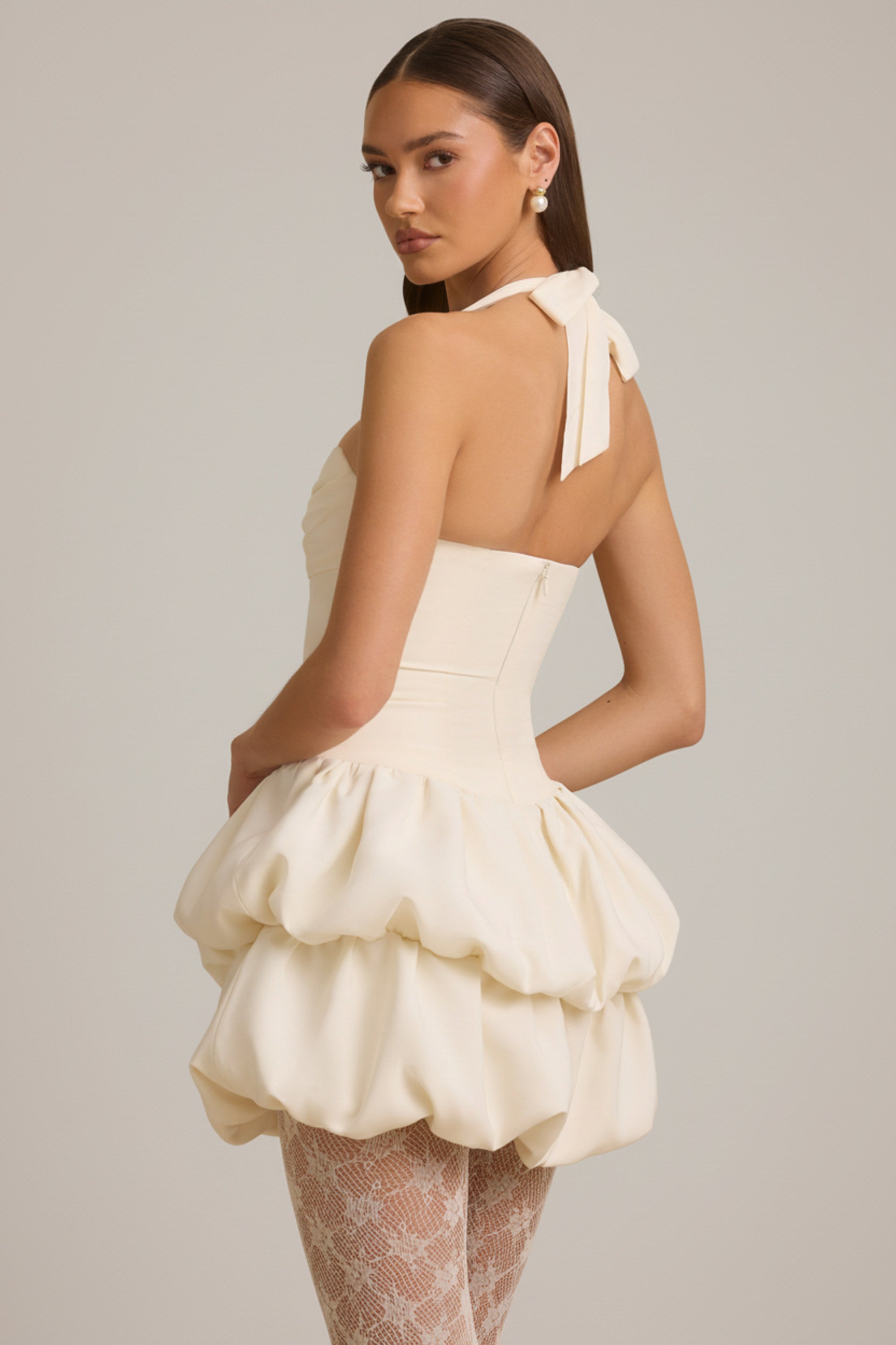 Andri Halterneck Layered Bubble Hem Corset Mini Dress in Ivory