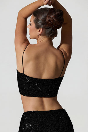 Oh Polly's Anna wearing the Ariana Full Top in Black Micro Sequin fabric perfect for a night out