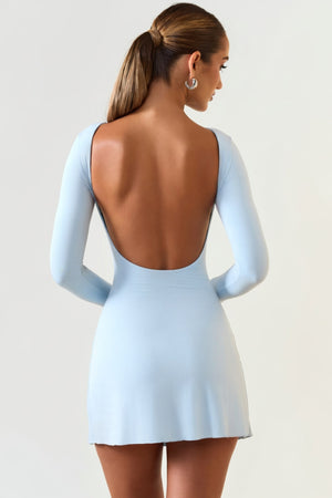 Oh Polly's Priscilla wearing the Brenna Mini Dress in Ice Blue Modal fabric perfect for rooftop parties
