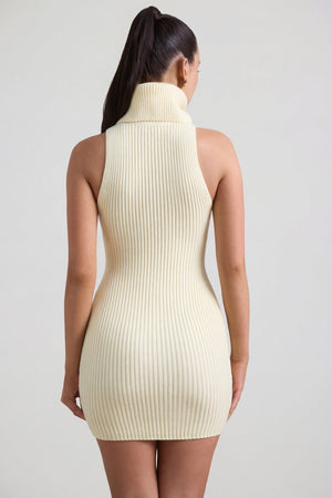 Oh Polly's Sarah wearing the Daiya Mini Dress in Butter Yellow Knitwear fabric perfect for summer brunches