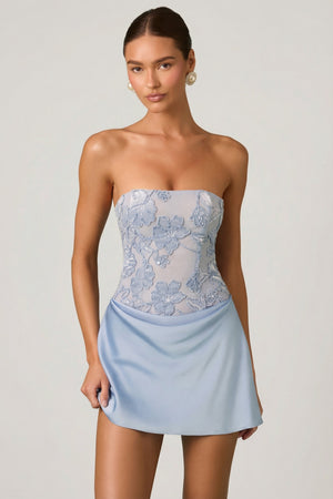Oh Polly's Anna wearing the Eden Mini Dress in Sky Blue Embellished fabric perfect for date nights