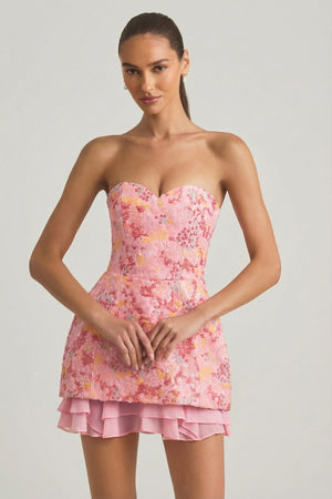 Oh Polly's Anna wearing the Eliselle Mini Dress in Pink Coral Artisan Chiffon fabric perfect for summer garden parties