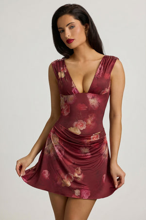 Oh Polly's Renee wearing the Embelia Mini Dress in Maroon Floral Print Jersey fabric perfect for rooftop cocktails