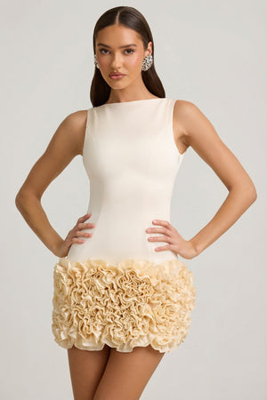 Oh Polly's Anna wearing the Florrie Mini Dress in Ivory Satin fabric perfect for birthday night out