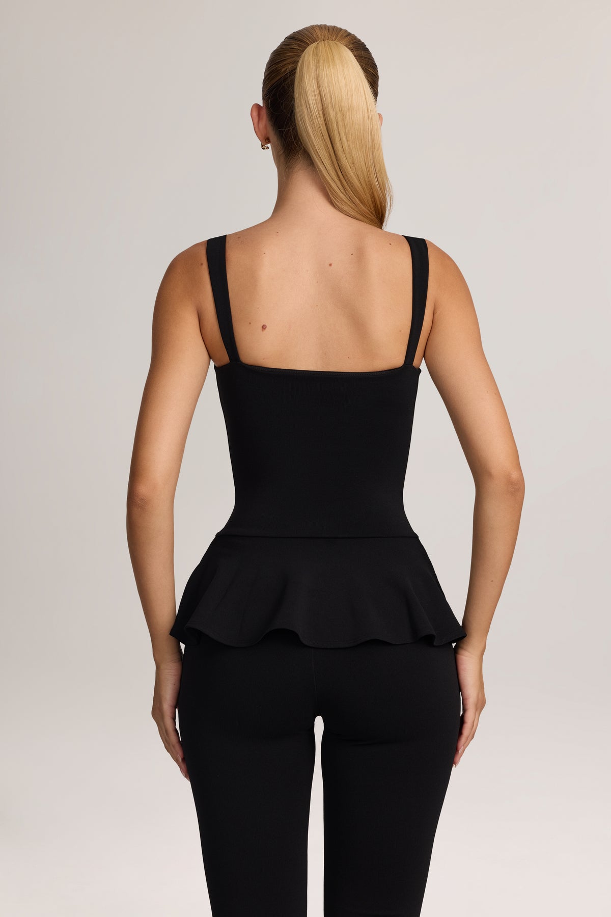 ⁣⁢Peplum-Oberteil aus Ponte in Schwarz⁤⁣