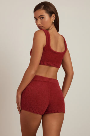 Oh Polly's Hayley wearing the Gulisa Mini Shorts in Ruby Red fabric perfect for night out looks