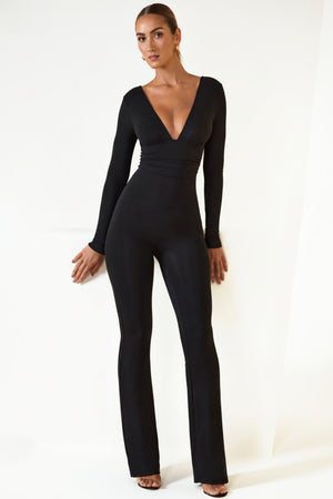 Oh Polly's Priscilla wearing the Helene Jumpsuit (reg) in Black Modal fabric perfect for evening events