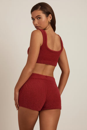 Oh Polly's Hayley wearing the Jada Crop Top in Ruby Red fabric perfect for girls' night out