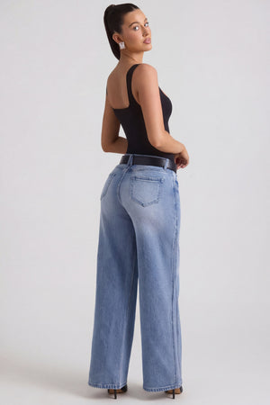 Oh Polly's Sarah wearing the Jeylan Trousers in Vintage Wash Denim fabric perfect for casual date nights