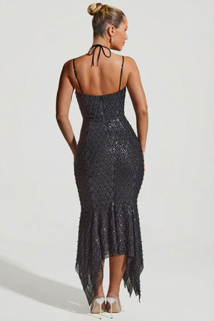 Oh Polly's Sierra Skye wearing the Josephine Midaxi Dress in Black Embellished fabric perfect for holiday celebrations