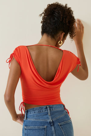 Oh Polly's Duda wearing the Kaede Crop Top in Scarlet Jersey fabric perfect for girls' night out