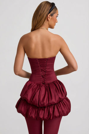 Oh Polly's Priscilla wearing the Laela Mini Dress in Wine Red Satin fabric perfect for a cocktail party night