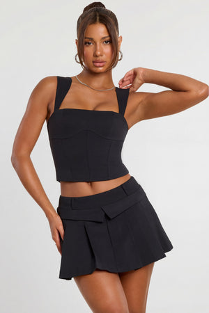 Oh Polly's Kiele wearing the Laurel Corset Top in Black Wool fabric perfect for a night out