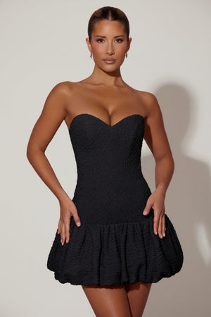 Cut-Out Bubble Hem Corset Mini Dress in Black