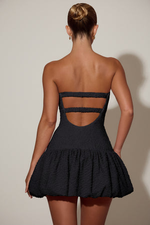 Cut-Out Bubble Hem Corset Mini Dress in Black