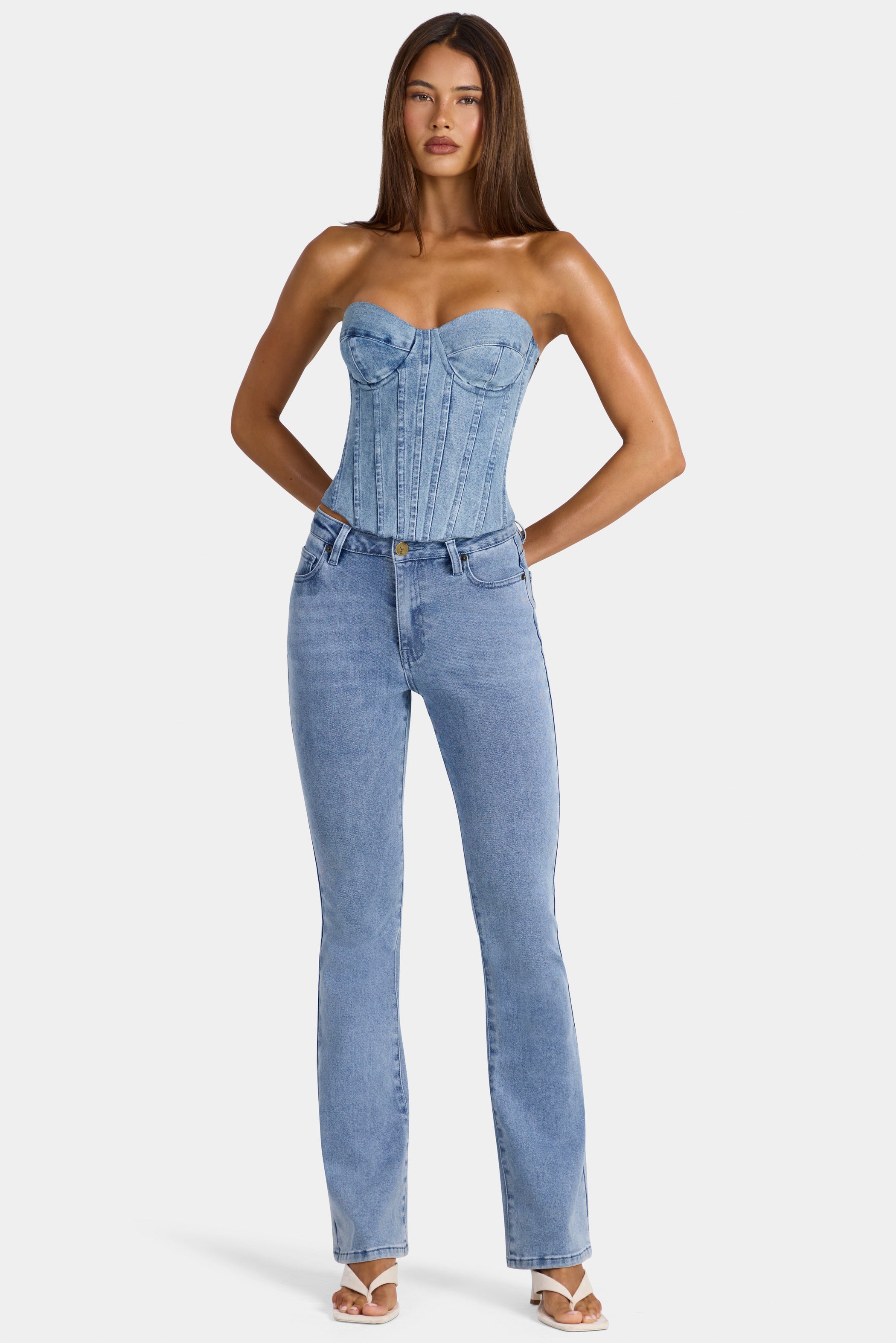 Low-Rise Flared Jeans  in Mid-Blue