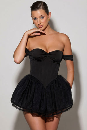 Oh Polly's Sarah wearing the Meredith Mini Dress in Black Tulle fabric perfect for holiday gatherings