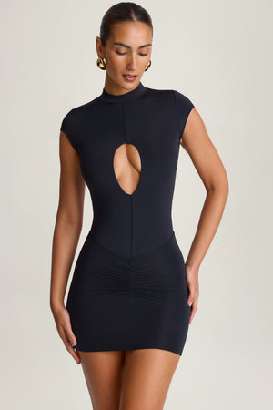 Oh Polly's Anna wearing the Morgana Mini Skirt in Black Sheer Jersey fabric perfect for party events